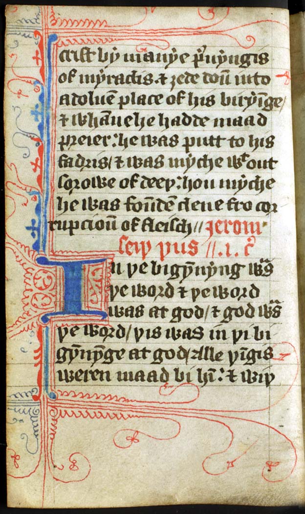 A page from a John Wycliffe Bible with decorative flourishes in blue and red ink