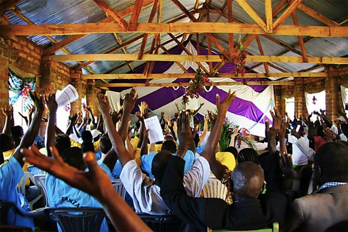 Image of a church celebrating the launch of the book of Luke in the Ikoma language in Tanzania