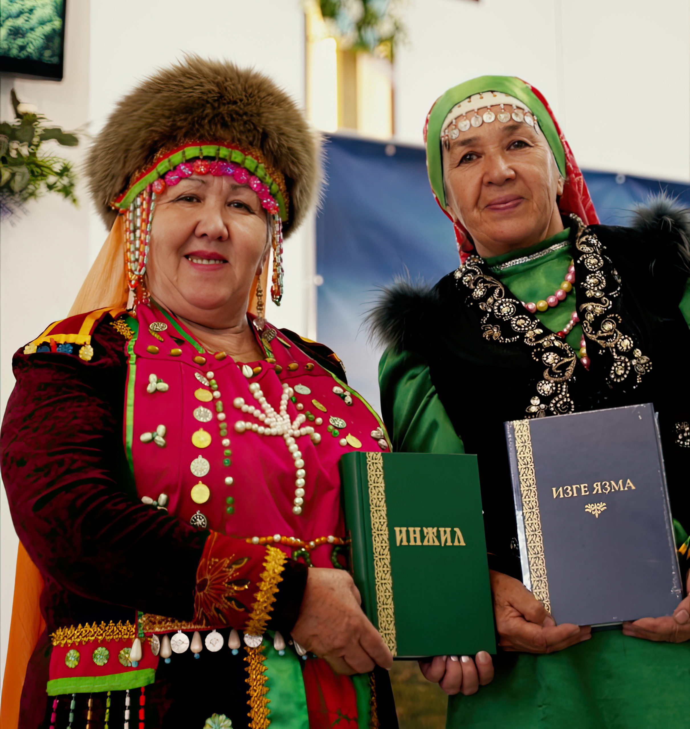Image of two Bashkir women with the newly launched Bashkir Bible