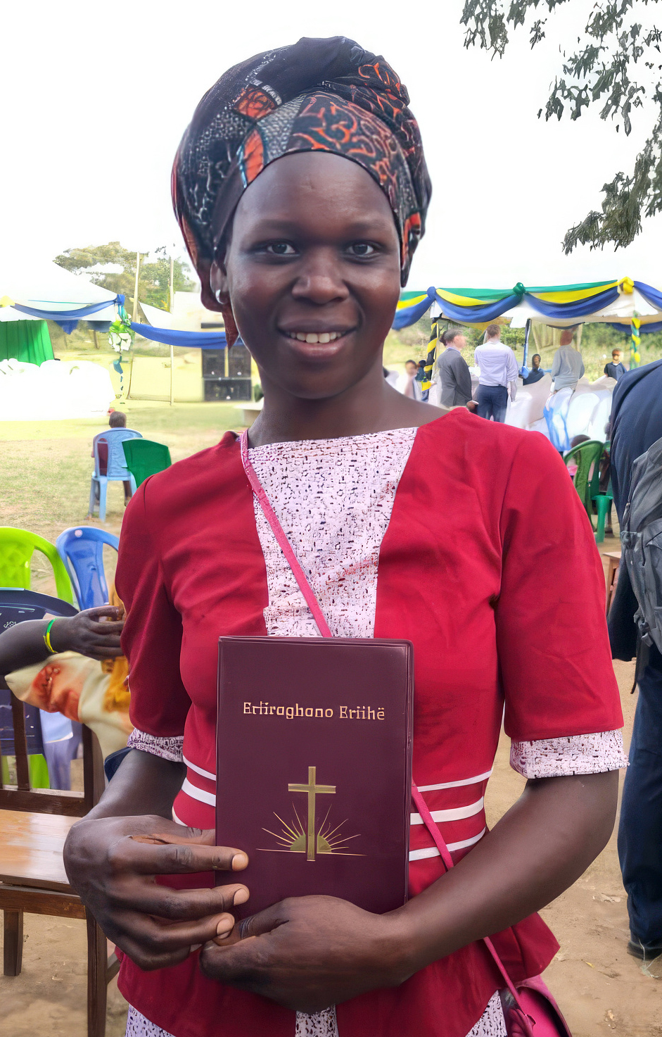 Image of Neema, an Ikoma speaker, at the launch of the Ikoma New Testament on 10 March 2023 in Tanzania