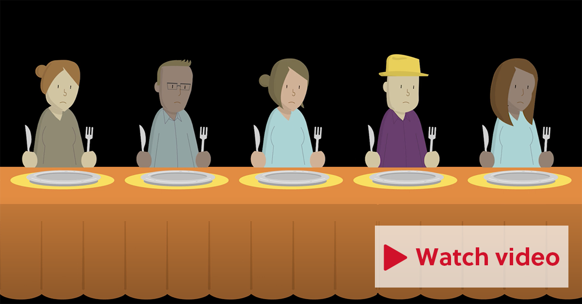 Image of people sitting at a dinner table with empty plates