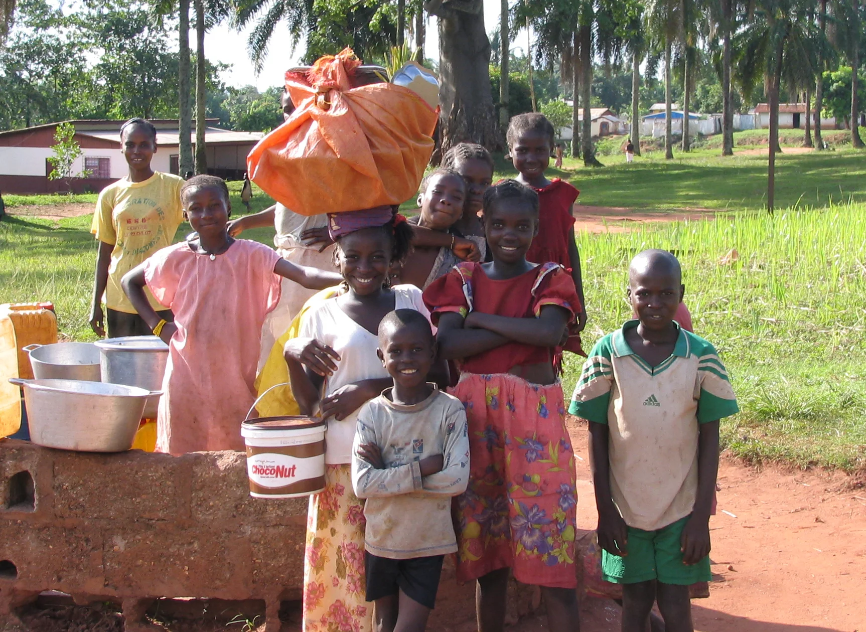 Image of Bhogoto children in the Central African Republic standing at a well