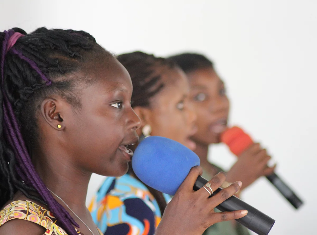 Image of Emma, Paulette's daughter, singing in church