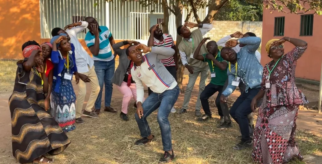 Image of members of the Cokwe ‘Psalms that Sing’ team acting out Psalm 8