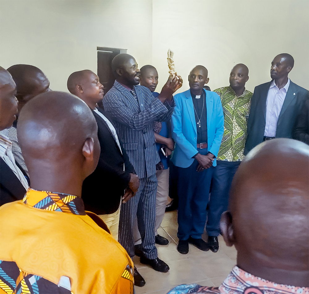 Image of The Hema and Bira translation teams celebrating peace together in DRC