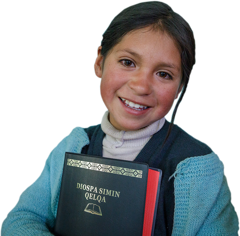 Image of a Quechuan girl in Peru with her Quechuan Bible